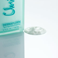 Christine Valmy's all-natural Dermafluide: Cleansing Milk & Makeup Remover’s texture is shown to the right of the product