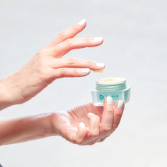 Christine Valmy's all-natural Valessence 100: Firming & Anti-Wrinkle Eye Cream being held by hands