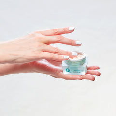 Christine Valmy's all-natural Valissima: Nourishing Night Cream being held by hands