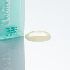 Christine Valmy's all-natural Vita Repair: Skin Replenishing Serum’s texture is shown to the right of the product
