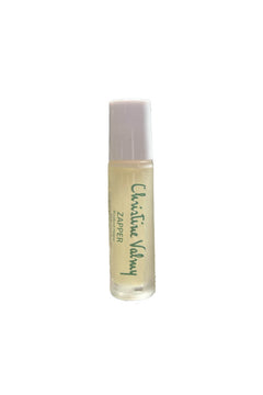 Christine Valmy's all-natural Zapper for oily and breakout-prone skin against a white background. Small, clear, and glass rollerball tube.