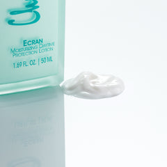 Christine Valmy's all-natural Ecran: Daytime Protection & Moisturizing Lotion’s texture is shown to the right of the product