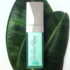 Christine Valmy's all-natural Q Serum: Oily Skin Correcting Serum's ingredients are shown next to the product
