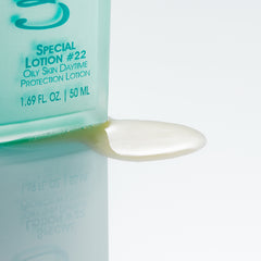Christine Valmy's all-natural Special Lotion #22: Daytime Protection & Moisturizing Lotion’s texture is shown to the right of the product 